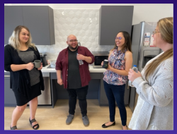 Four employees of Independent Texas Registered Agent laugh together at their office in Austin.